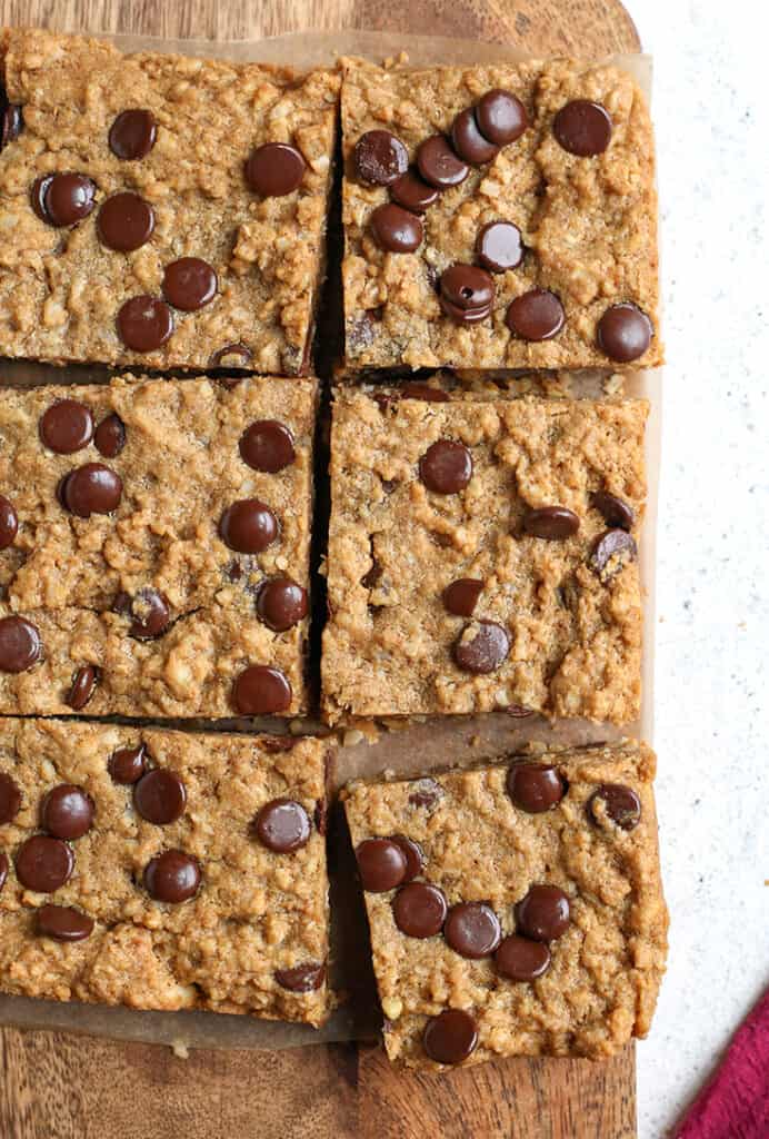 paleo oatmeal cookie bars, cut with chocolate chips on top