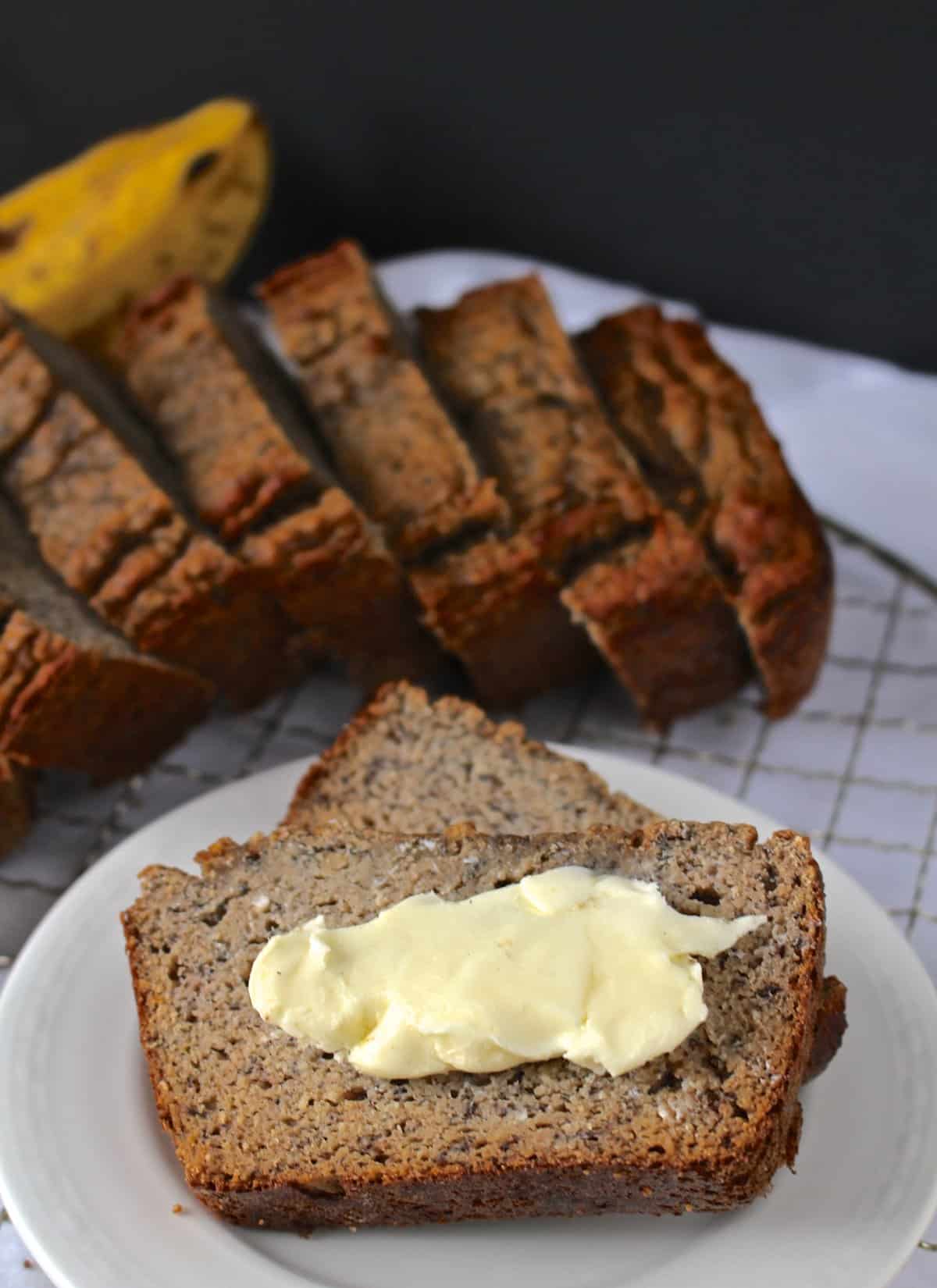 This Paleo Banana Bread is so simple to make- using only a few ingredients, but tastes incredible! Perfect for breakfast. 