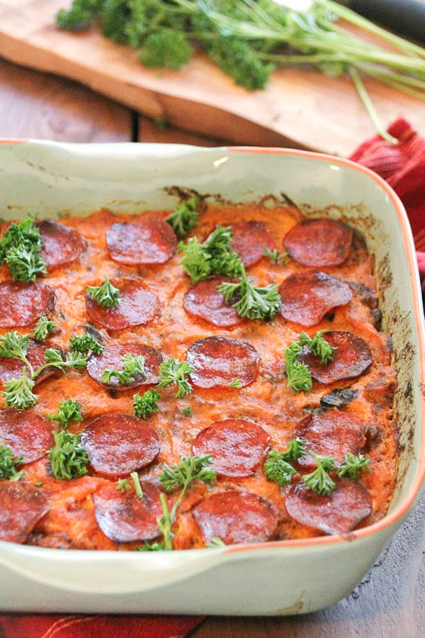 This Paleo Baked Spaghetti is loaded with veggies, but feels like comfort food. All the flavors of delicious spaghetti with crispy pepperoni on top- the best!