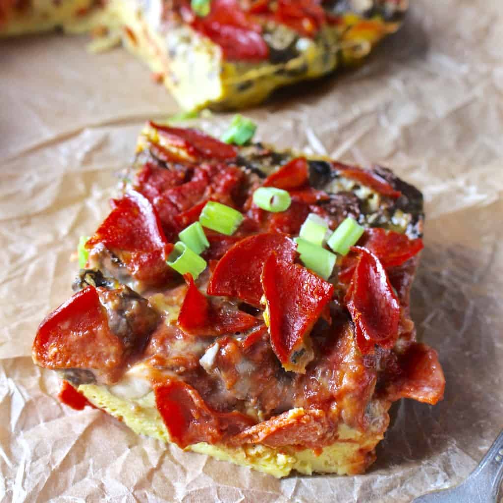 This Paleo Breakfast Pizza Quiche has all the flavors you love about pizza, but made to be eaten at breakfast...or anytime of day. Hearty and delicious while being Whole30, gluten free, and dairy free. 