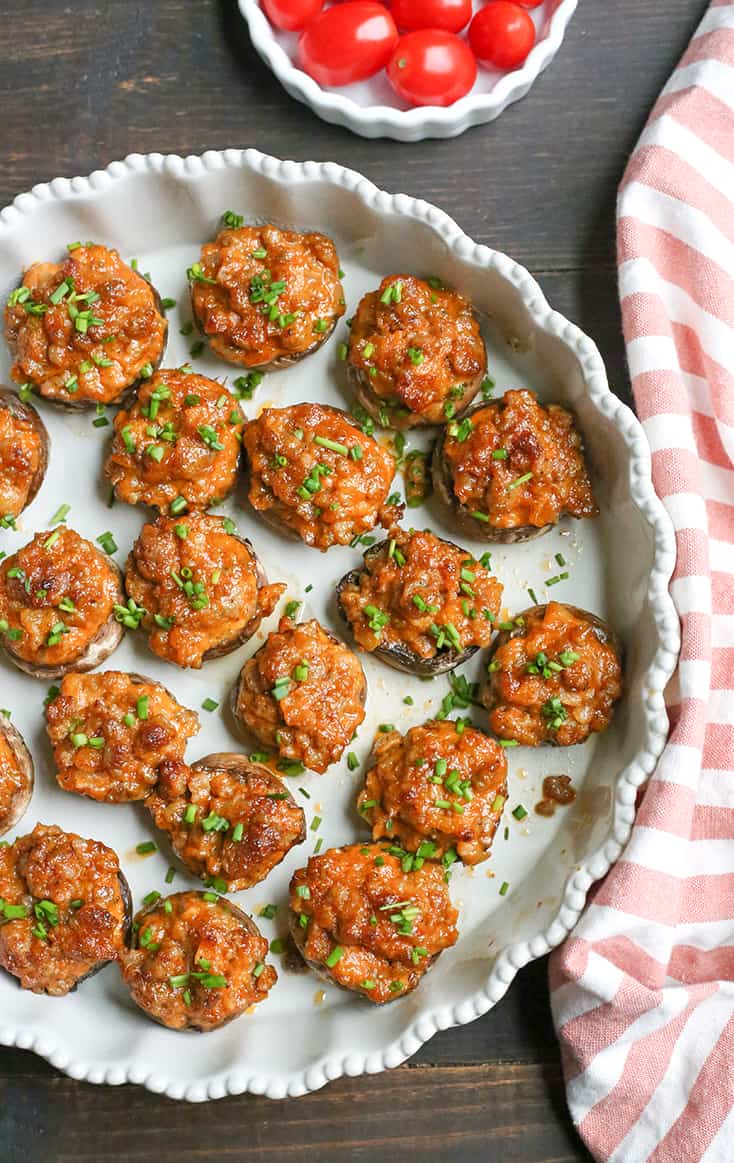 These Chipotle Stuffed Mushrooms are a kicked up appetizer that everyone will love. Sausage, Chipotle Mayo and onion make the best combination. Paleo, Whole30, gluten free and dairy free!