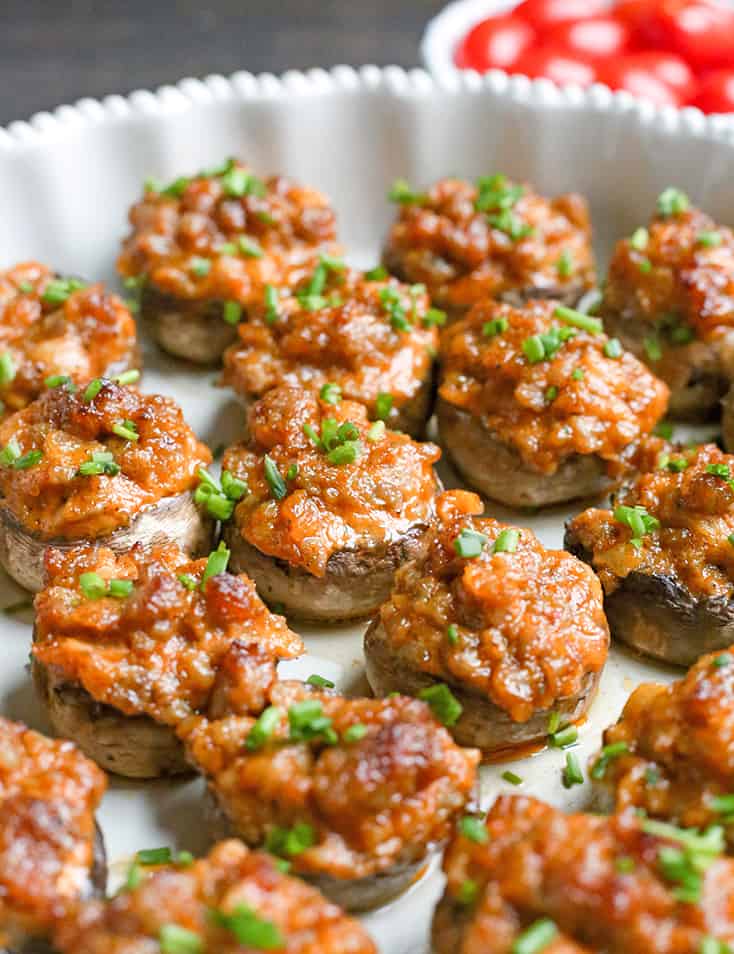 These Chipotle Stuffed Mushrooms are a kicked up appetizer that everyone will love. Sausage, Chipotle Mayo and onion make the best combination. Paleo, Whole30, gluten free and dairy free!