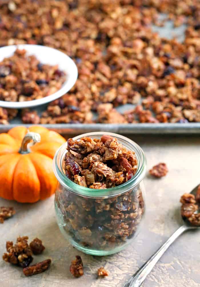This Paleo Pumpkin Granola is healthy, easy, and so delicious!! Packed with nuts, coconut, and pumpkin and sweetened only with real maple syrup. This makes the perfect breakfast or snack. Gluten free, dairy free, and naturally sweetened. 