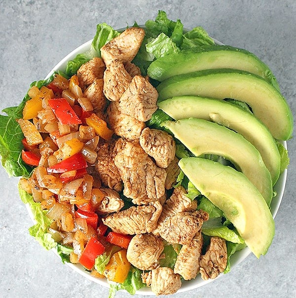 Chicken Fajita Bowl on a gray surface. 