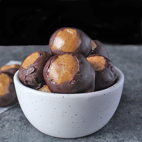 These Healthy Paleo Buckeyes are naturally sweetened and are gluten free and dairy free. A classic treat, made over to be healthier and still just as delicious!