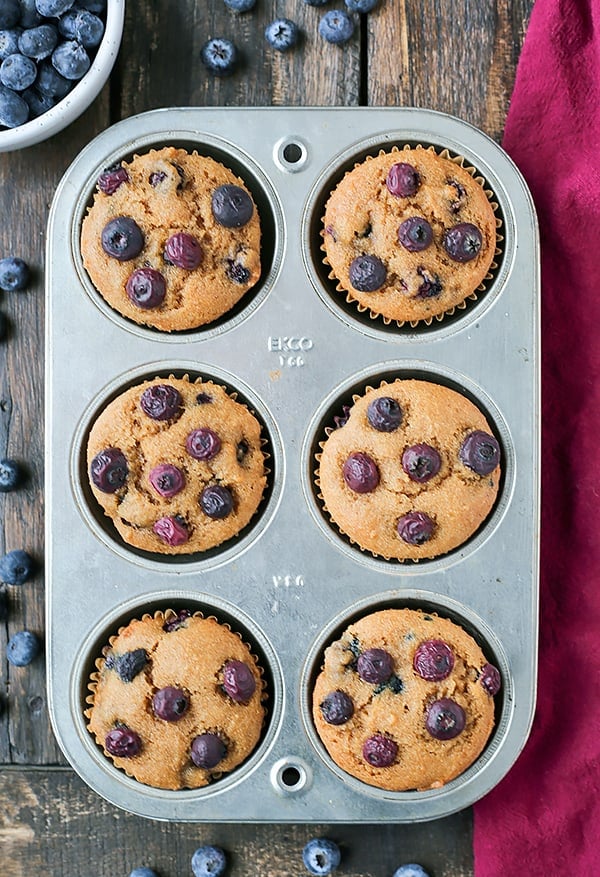 These Easy Paleo Blueberry Muffins are so quick and easy! They are super moist, packed with juicy blueberries, and make a great breakfast. Gluten free, dairy free, and naturally sweetened.