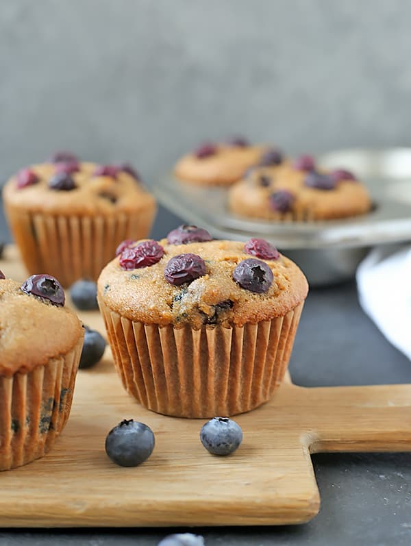These Easy Paleo Blueberry Muffins are so quick and easy! They are super moist, packed with juicy blueberries, and make a great breakfast. Gluten free, dairy free, and naturally sweetened.