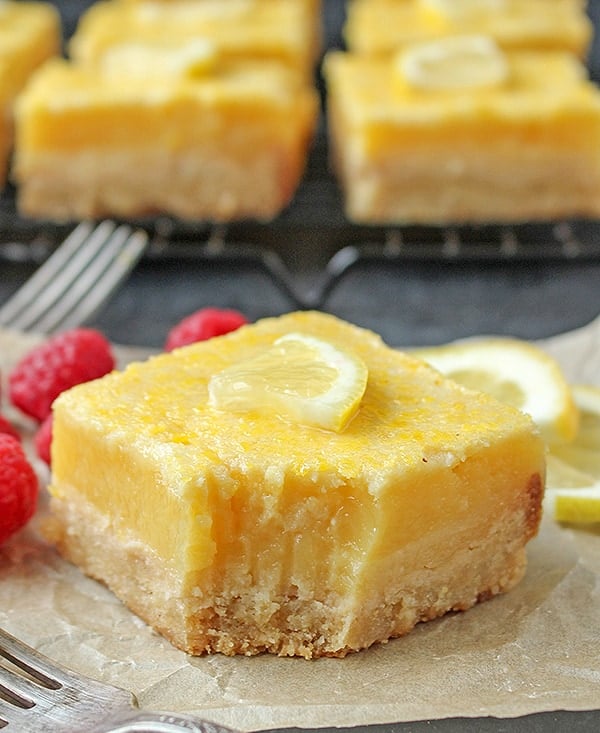These Paleo Lemon Bars are so full of bright lemon flavor. A simple shortbread crust topped with a creamy, tart lemon filling that is delicious and perfect for spring. They are gluten free, dairy free, and naturally sweetened.