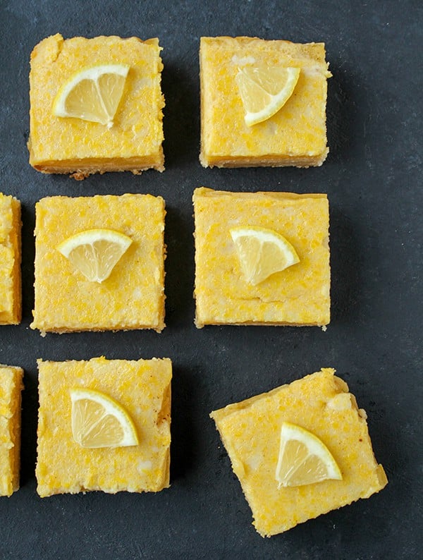 These Paleo Lemon Bars are so full of bright lemon flavor. A simple shortbread crust topped with a creamy, tart lemon filling that is delicious and perfect for spring. They are gluten free, dairy free, and naturally sweetened.