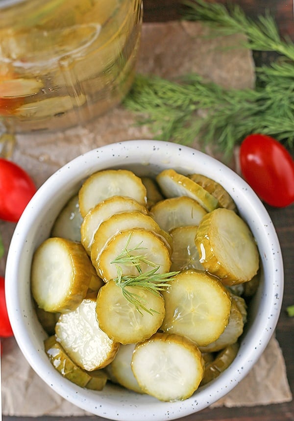 These Paleo Whole30 Dill Pickles are easy and delicious. A healthy alternative to store bought and they take just minutes to make. Crunchy, garlicky, and so good. Made low fodmap with garlic oil!