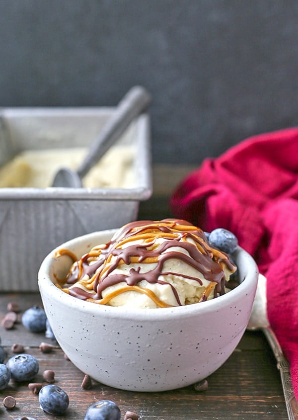 This Paleo Vanilla Bean Ice Cream is creamy, sweet, and so perfect for summer! Only 5 ingredients and ready to be topped with your favorite toppings. Gluten free, dairy free, and naturally sweetened.