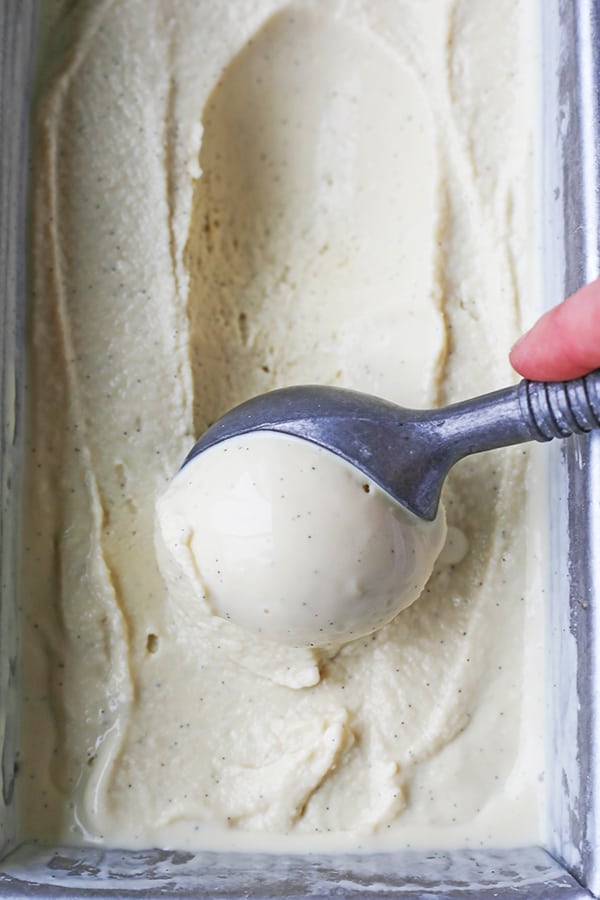 This Paleo Vanilla Bean Ice Cream is creamy, sweet, and so perfect for summer! Only 5 ingredients and ready to be topped with your favorite toppings. Gluten free, dairy free, and naturally sweetened.