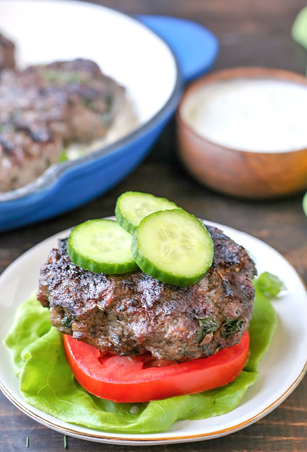 These Paleo Whole30 Grilled Gyro Burgers are easy to make and packed with so much flavor! The perfect burger to make for your grill out! Low carb, keto, and low fodmap and everyone will enjoy them!