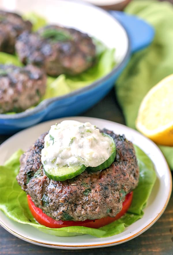 These Paleo Whole30 Grilled Gyro Burgers are easy to make and packed with so much flavor! The perfect burger to make for your grill out! Low carb, keto, and low fodmap and everyone will enjoy them!