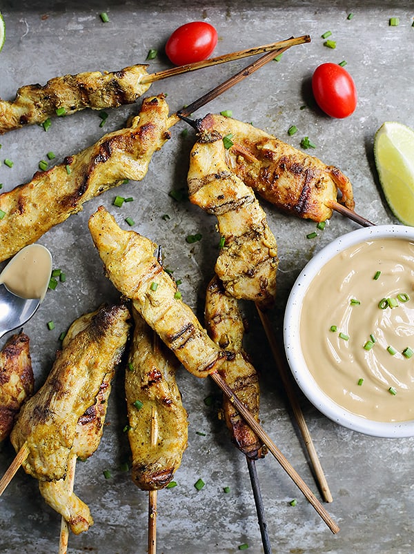 This Paleo Whole30 Chicken Satay with Sunbutter Sauce is a take on the popular Thai dish. Marinated chicken that is grilled then dipped in a flavorful sauce. Gluten free, dairy free, nut free, and low fodmap.