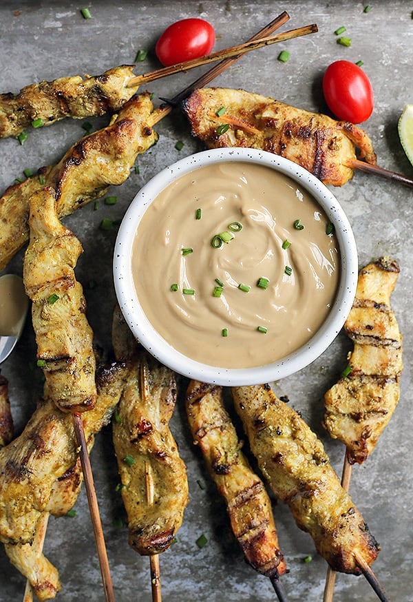 This Paleo Whole30 Chicken Satay with Sunbutter Sauce is a take on the popular Thai dish. Marinated chicken that is grilled then dipped in a flavorful sauce. Gluten free, dairy free, nut free, low carb and low fodmap.