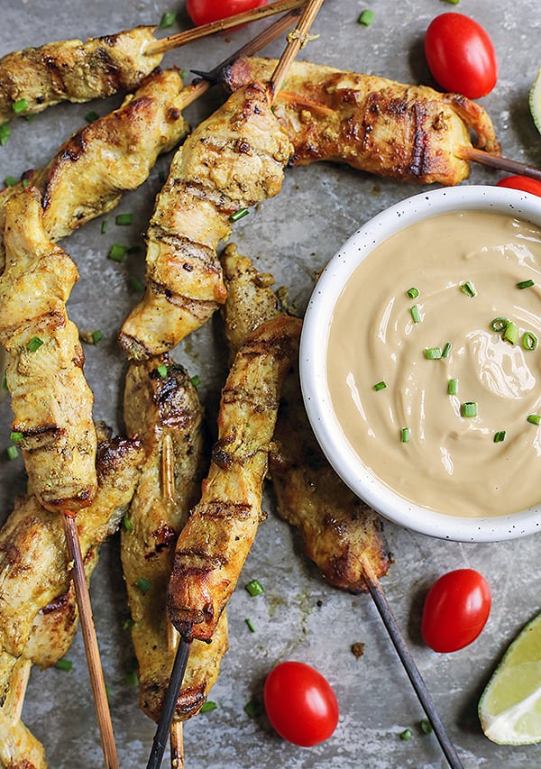 This Paleo Whole30 Chicken Satay with Sunbutter Sauce is a take on the popular Thai dish. Marinated chicken that is grilled then dipped in a flavorful sauce. Gluten free, dairy free, nut free, and low fodmap.