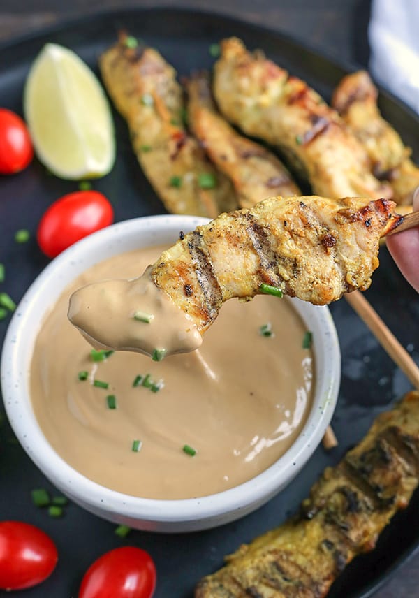 This Paleo Whole30 Chicken Satay with Sunbutter Sauce is a take on the popular Thai dish. Marinated chicken that is grilled then dipped in a flavorful sauce. Gluten free, dairy free, nut free, and low fodmap.