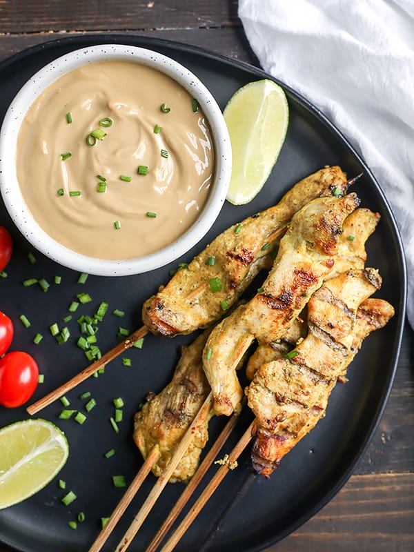 This Paleo Whole30 Chicken Satay with Sunbutter Sauce is a take on the popular Thai dish. Marinated chicken that is grilled then dipped in a flavorful sauce. Gluten free, dairy free, nut free, and low fodmap.