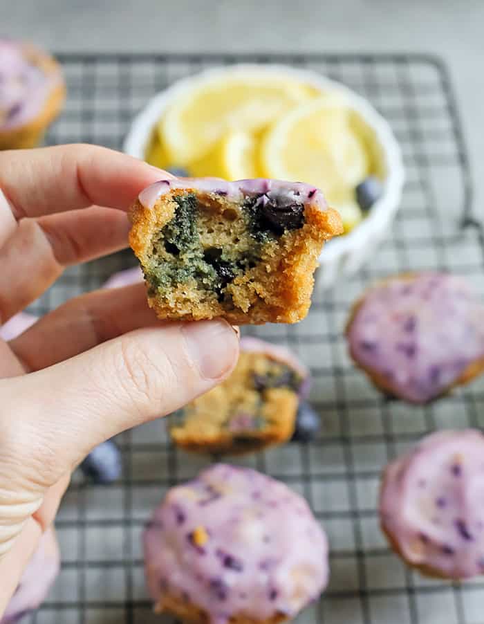 These Paleo Baked Blueberry Fritter Bites are easy to make and so delicious! Small, bite-size muffins covered in a blueberry glaze. They are gluten free, dairy free, and naturally sweetened.