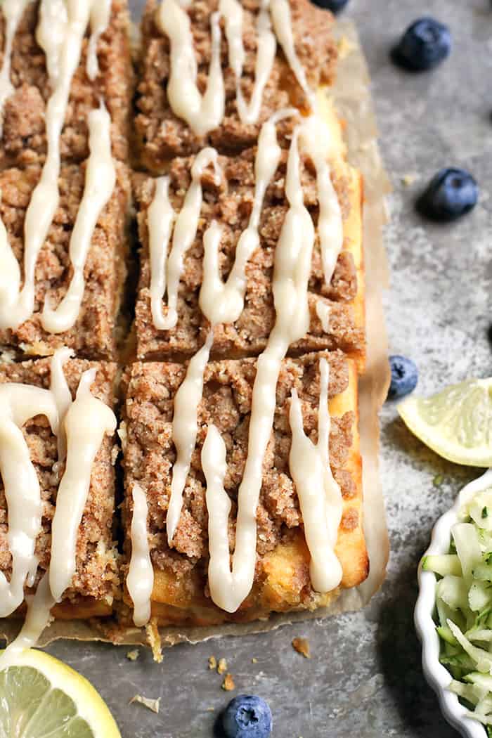 This Paleo Lemon Zucchini Coffee Cake is tender, moist, and has the best crumb topping! It's gluten free, dairy free, and is sure to become a new favorite!