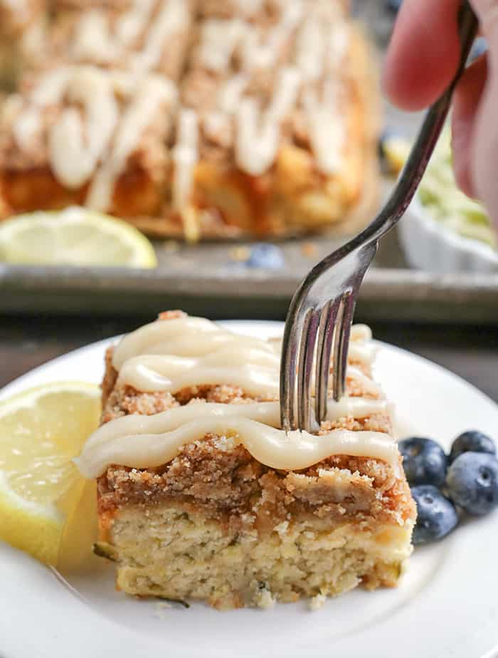 This Paleo Lemon Zucchini Coffee Cake is tender, moist, and has the best crumb topping! It's gluten free, dairy free, and is sure to become a new favorite!