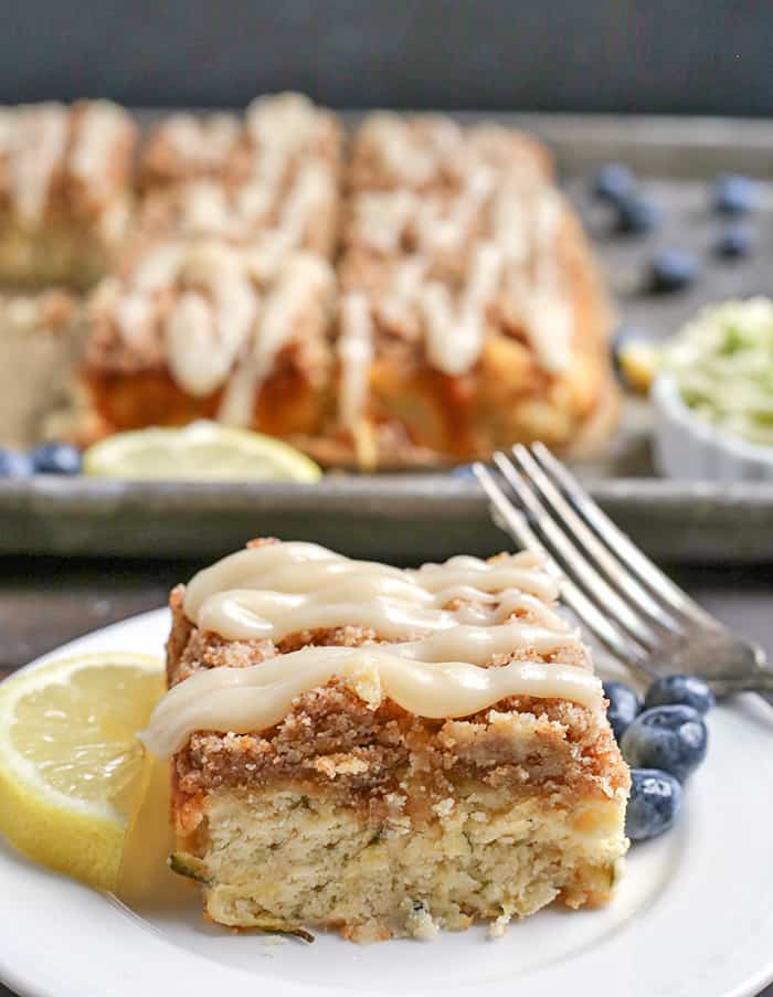 This Paleo Lemon Zucchini Coffee Cake is tender, moist, and has the best crumb topping! It's gluten free, dairy free, and is sure to become a new favorite!