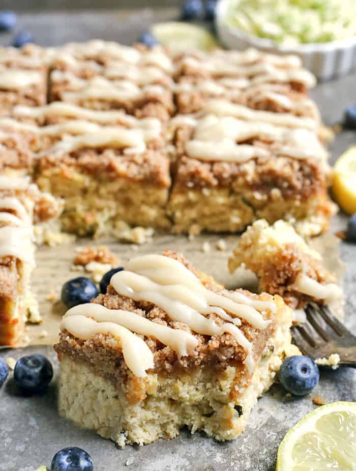 This Paleo Lemon Zucchini Coffee Cake is tender, moist, and has the best crumb topping! It's gluten free, dairy free, and is sure to become a new favorite!