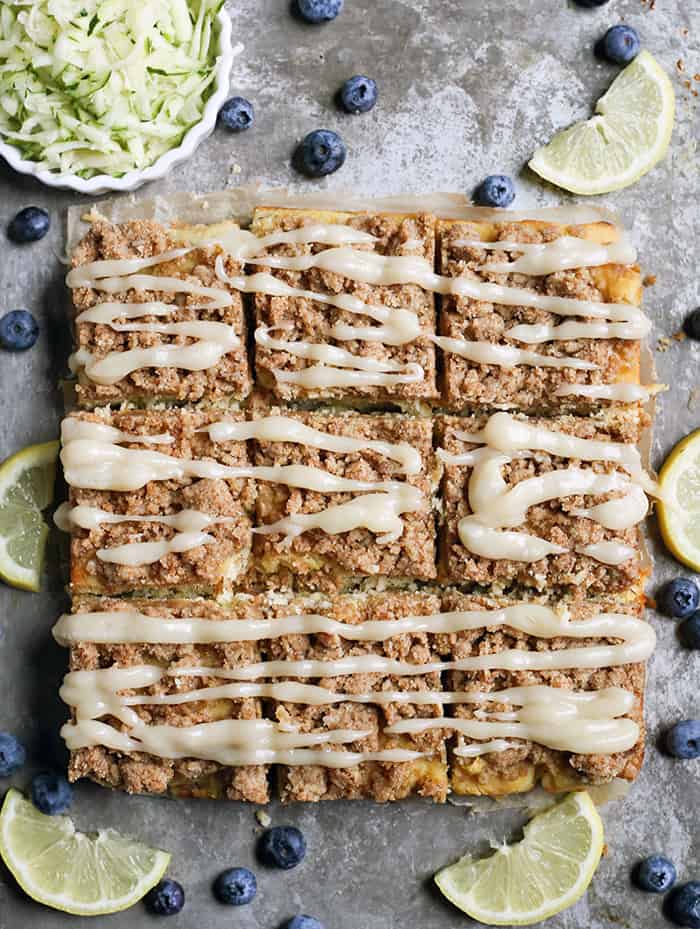 This Paleo Lemon Zucchini Coffee Cake is tender, moist, and has the best crumb topping! It's gluten free, dairy free, and is sure to become a new favorite!