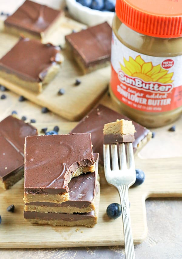 These Paleo No-Bake Nut-Free SunButter Chocolate Bars are so easy to make and totally irresistible. Soft, melt-in-your-mouth good and made healthy! They only contain 6 ingredients and are dairy free, gluten free, egg free, and vegan!