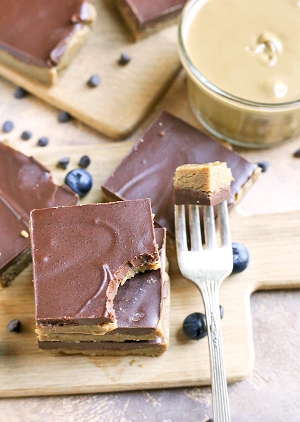 These Paleo No-Bake Nut-Free SunButter Chocolate Bars are so easy to make and totally irresistible. Soft, melt-in-your-mouth good and made healthy! They only contain 6 ingredients and are dairy free, gluten free, egg free, and vegan!