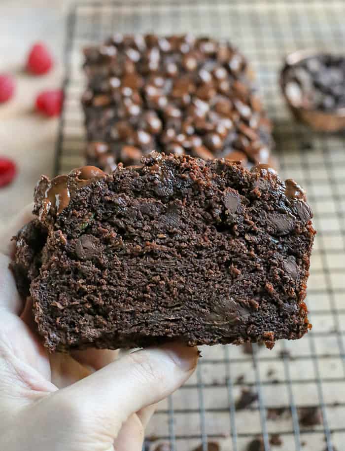 This Paleo Nut-Free Double Chocolate Zucchini Bread is rich, moist, and so chocolatey! It tastes like a decadent dessert, but made healthy! Gluten free, dairy free, and naturally sweetened.