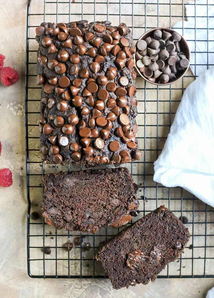 This Paleo Nut-Free Double Chocolate Zucchini Bread is rich, moist, and so chocolatey! It tastes like a decadent dessert, but made healthy! Gluten free, dairy free, and naturally sweetened.