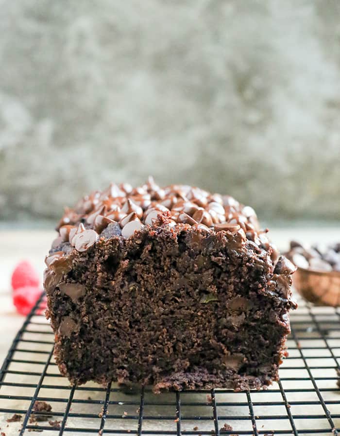 This Paleo Nut-Free Double Chocolate Zucchini Bread is rich, moist, and so chocolatey! It tastes like a decadent dessert, but made healthy! Gluten free, dairy free, and naturally sweetened.