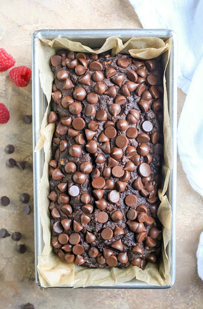 This Paleo Nut-Free Double Chocolate Zucchini Bread is rich, moist, and so chocolatey! It tastes like a decadent dessert, but made healthy! Gluten free, dairy free, and naturally sweetened.