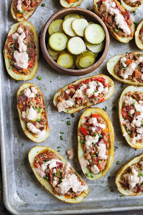 These Paleo Whole30 Bacon Hamburger Potato Skins have all the flavors of a juicy burger, but packed in a crispy potato skin. Such a fun meal that everyone will love. They are gluten free, dairy free, and low fodmap.