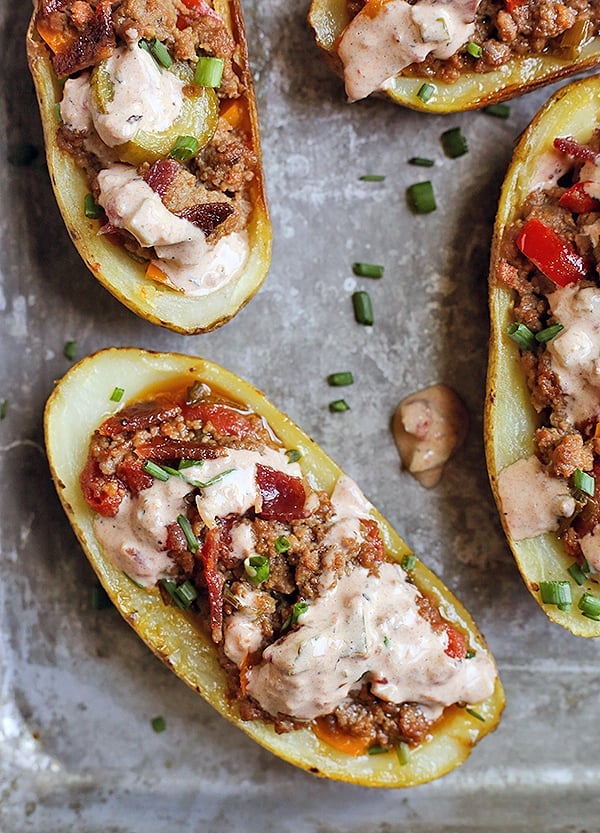 These Paleo Whole30 Bacon Hamburger Potato Skins have all the flavors of a juicy burger, but packed in a crispy potato skin. Such a fun meal that everyone will love. They are gluten free, dairy free, and low fodmap.