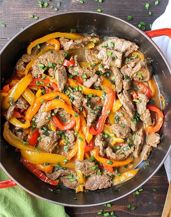 This Paleo Whole30 Easy Pepper Steak is quick and flavorful! Tender beef and thinly sliced peppers covered in a savory sauce. Gluten free, dairy free, and low FODMAP. 