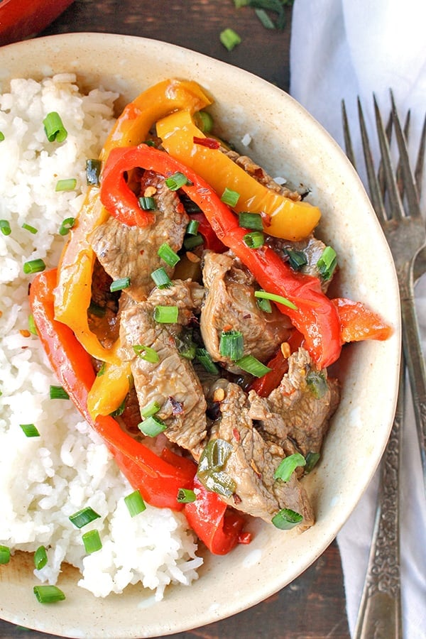 This Paleo Whole30 Easy Pepper Steak is quick and flavorful! Tender beef and thinly sliced peppers covered in a savory sauce. Gluten free, dairy free, and low FODMAP. 