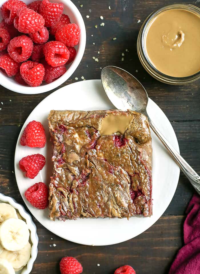 This Paleo SunButter Jelly Breakfast Bake has all the classic pbj flavors, but grain and sugar free. It is a great make ahead breakfast that is satisfying and delicious. Gluten free, dairy free, nut free, with an egg free option.