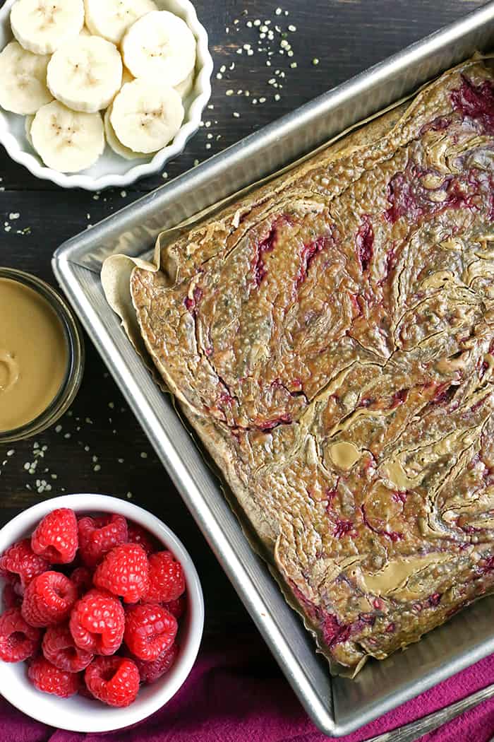 This Paleo SunButter Jelly Breakfast Bake has all the classic pbj flavors, but grain and sugar free. It is a great make ahead breakfast that is satisfying and delicious. Gluten free, dairy free, nut free, with an egg free option.