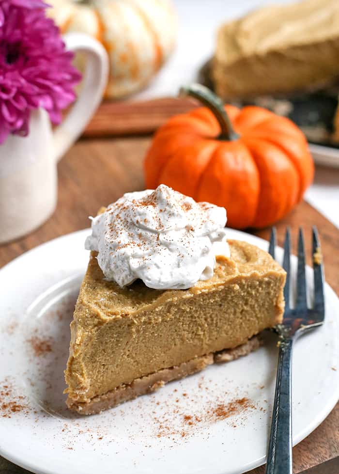 This Paleo Vegan Pumpkin Cheesecake is super creamy with a graham cracker-like crust and a filling made with cashews. It is gluten free, dairy free, vegan, naturally sweetened and almost completely no-bake. A dessert everyone will love.