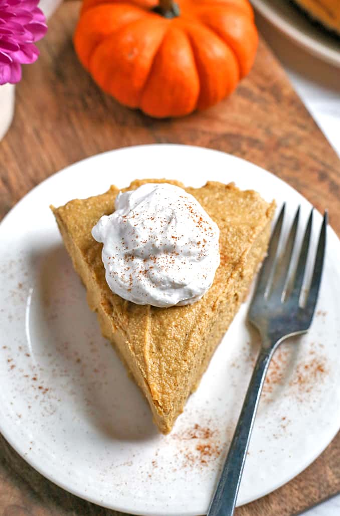 This Paleo Vegan Pumpkin Cheesecake is super creamy with a graham cracker-like crust and a filling made with cashews. It is gluten free, dairy free, vegan, naturally sweetened and almost completely no-bake. A dessert everyone will love.