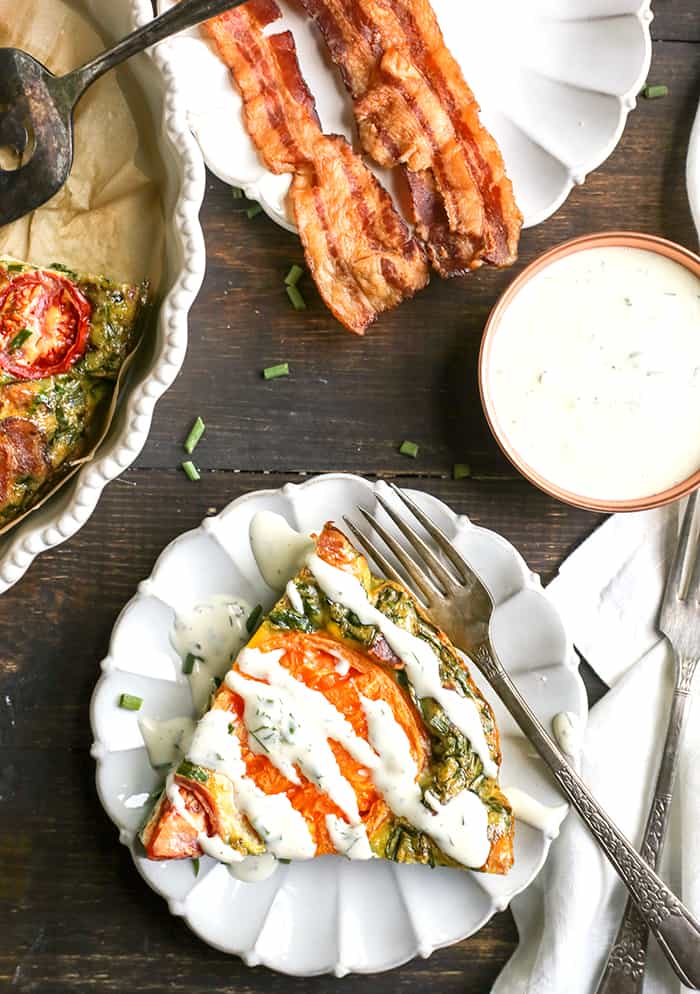 This Paleo Whole30 BLT Breakfast Bake has all the flavors of a BLT, but packed in a delicious egg bake. Crispy bacon, baby spinach, and fresh tomatoes combine for a tasty, filling breakfast. Gluten free, dairy free, low carb, and low fodmap.