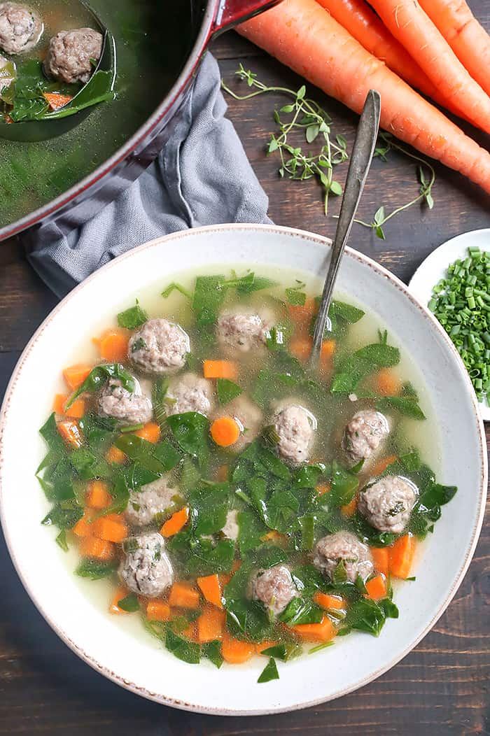 This Paleo Whole30 Italian Wedding Soup is hearty, flavorful, and easy! Tender, juicy meatballs in a veggie filled broth that will sure to become a family favorite. Gluten free, dairy free, egg free, and low fodmap.