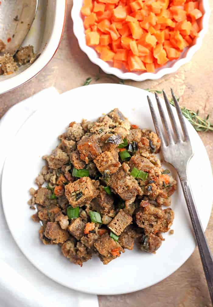 This Paleo Low Carb Sausage Stuffing is hearty, flavorful, and no one will know it's healthy! It has all the flavors of traditional stuffing, but made nut free, gluten free, dairy free, and low FODMAP!