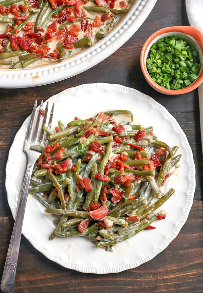 This Paleo Low FODMAP Green Bean Casserole is easy to make, full of flavor, and a healthy side dish. The green beans are covered in a creamy sauce and topped with bacon. Gluten free, dairy free, and Whole30. 