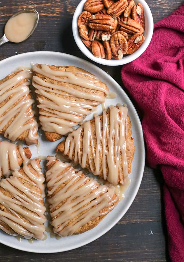 These Paleo Pecan Pie Scones are a fun treat that are easy to make and so delicious! Tender, not overly sweet, and pairs great with a cup of coffee. They are gluten free, dairy free, and naturally sweetened.