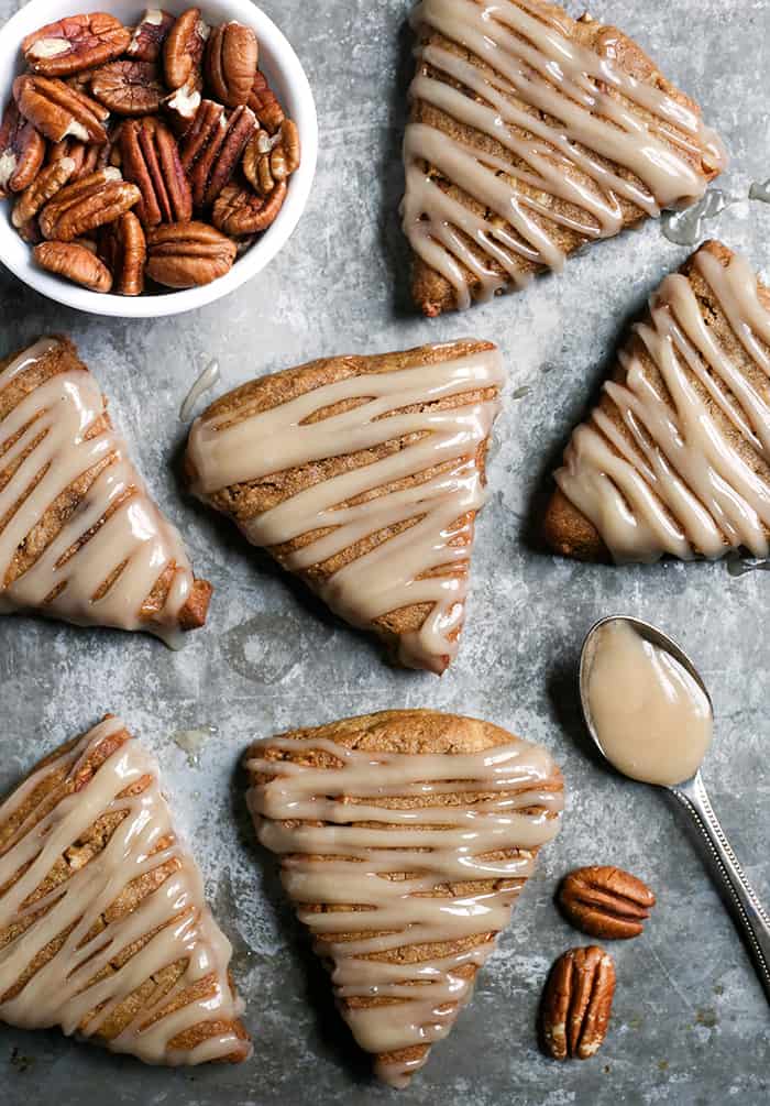 These Paleo Pecan Pie Scones are a fun treat that are easy to make and so delicious! Tender, not overly sweet, and pairs great with a cup of coffee. They are gluten free, dairy free, and naturally sweetened.