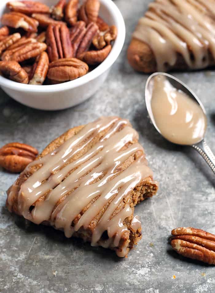 These Paleo Pecan Pie Scones are a fun treat that are easy to make and so delicious! Tender, not overly sweet, and pairs great with a cup of coffee. They are gluten free, dairy free, and naturally sweetened.